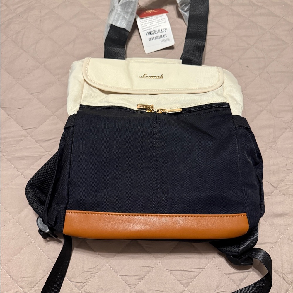 Stylish Black and Cream Backpack with Tan Trim